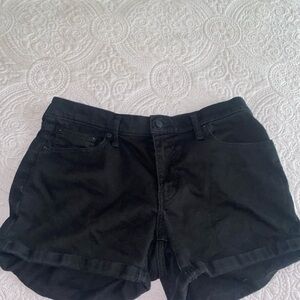 Womens Levi’s mid length black denim shorts . Size 32
